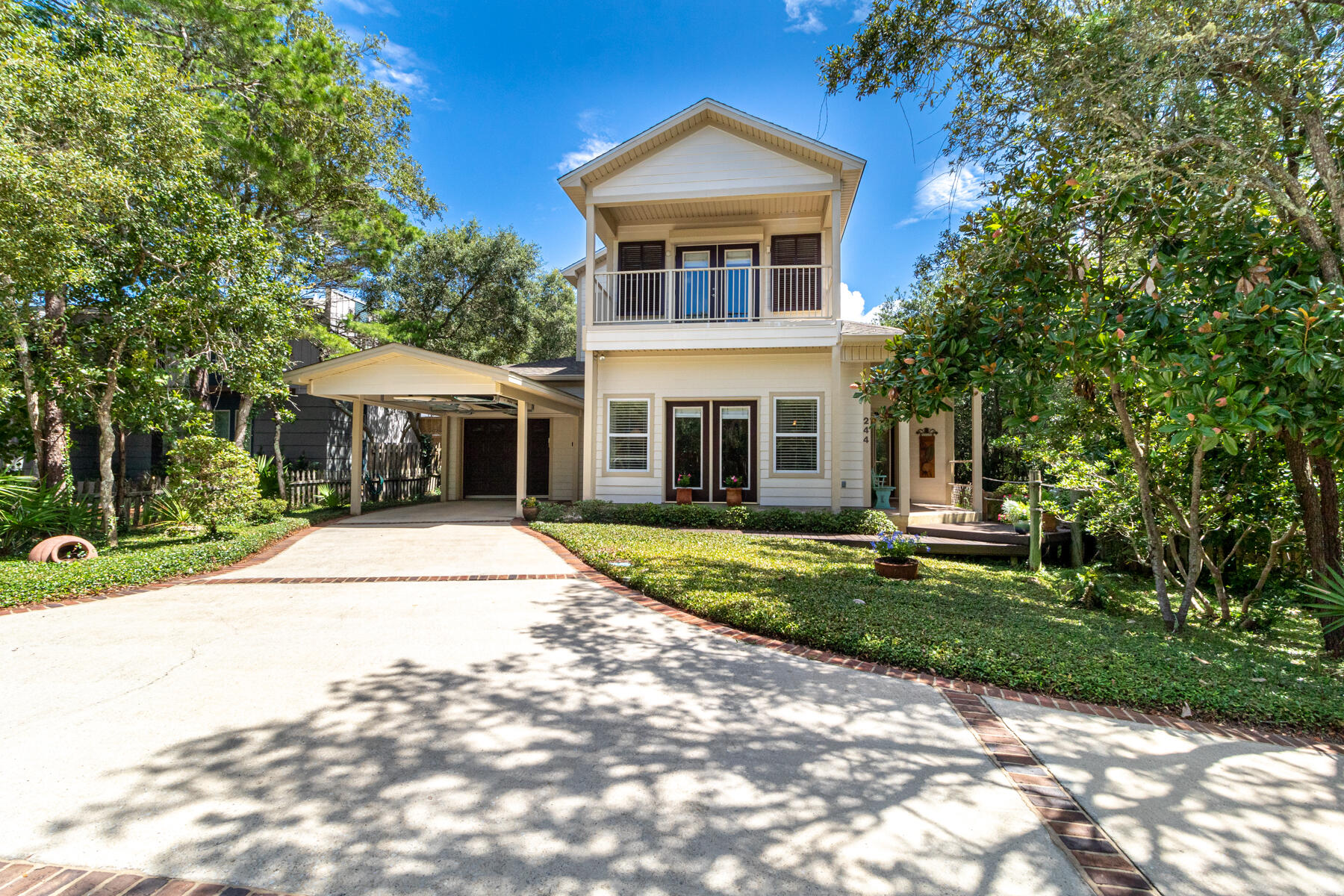 244 Baird Road Santa Rosa Beach, FL 32459 - Photo 54 of 63 a front view of a house with a yard