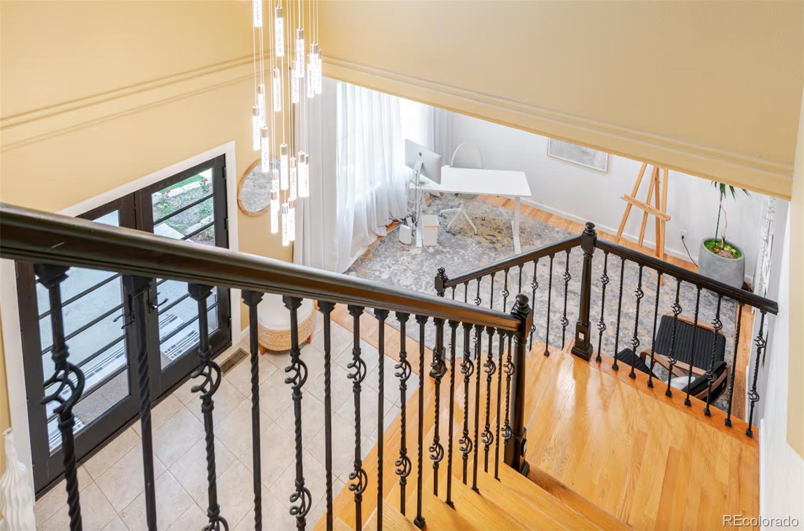 14532 Inca Court Westminster, CO 80023 - Photo 14 of 35 a view of staircase with railing and a window