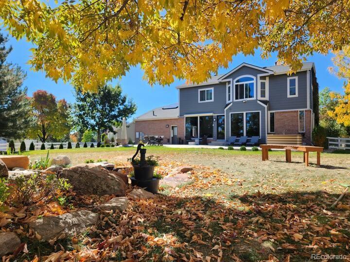 14532 Inca Court Westminster, CO 80023 - Photo 35 of 35 a front view of a house with swimming pool