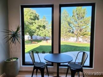 14532 Inca Court Westminster, CO 80023 - Photo 7 of 35 a view of a dining room with furniture window and outside view