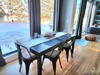 14532 Inca Court Westminster, CO 80023 - Photo 9 of 35 a view of a dining room with furniture and window