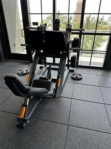 a view of swimming pool with outdoor seating
