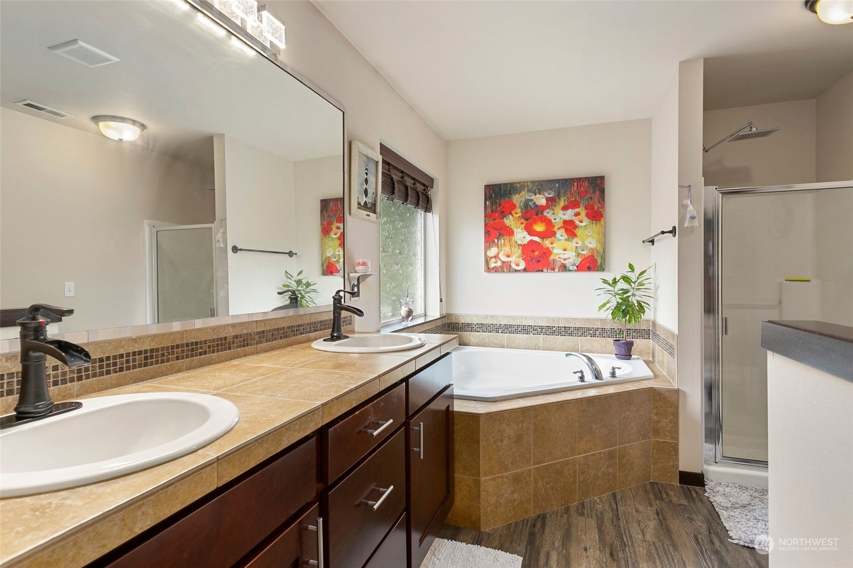 408 171st Street Southeast Bothell, WA 98012 - Photo 20 of 31 a bathroom with a tub sink and mirror