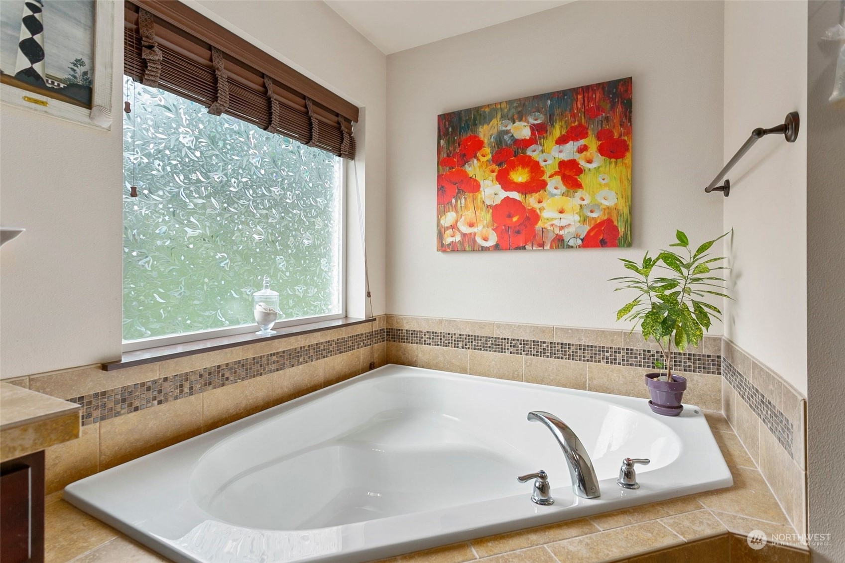 408 171st Street Southeast Bothell, WA 98012 - Photo 21 of 31 a bath tub sitting in a bathroom next to a window