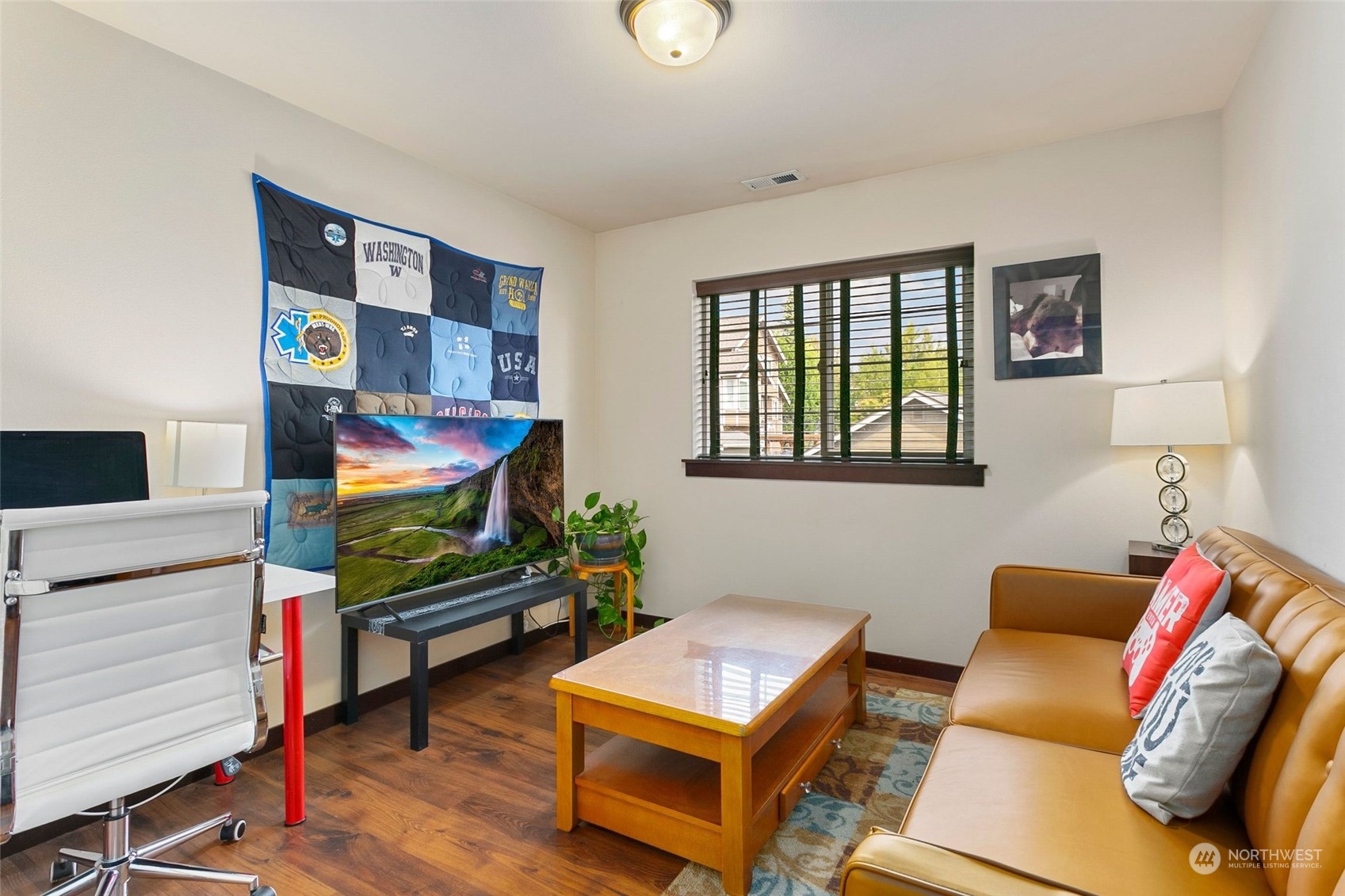 408 171st Street Southeast Bothell, WA 98012 - Photo 22 of 31 a living room with furniture and a window