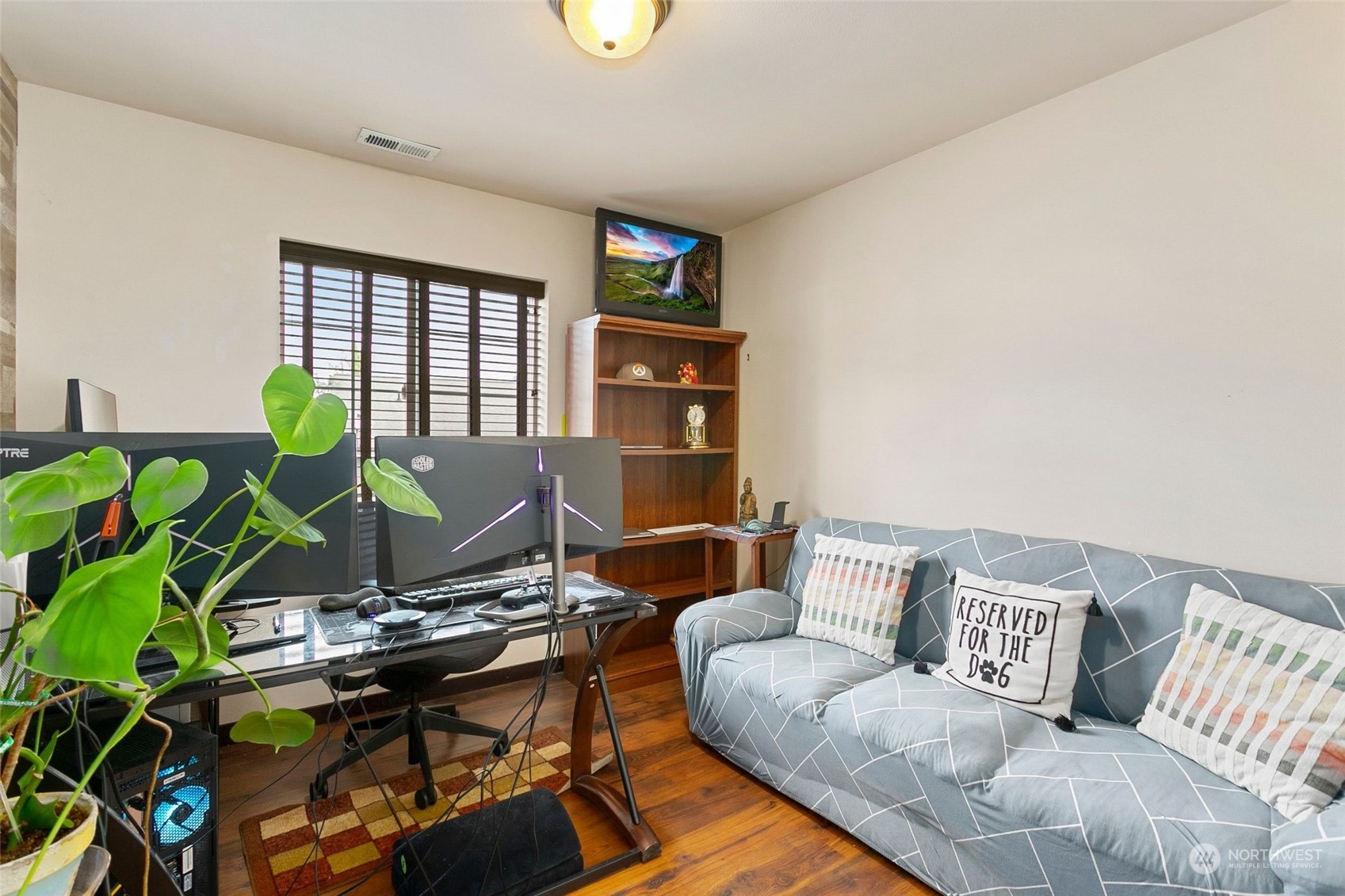 408 171st Street Southeast Bothell, WA 98012 - Photo 23 of 31 a living room with furniture and wooden floor
