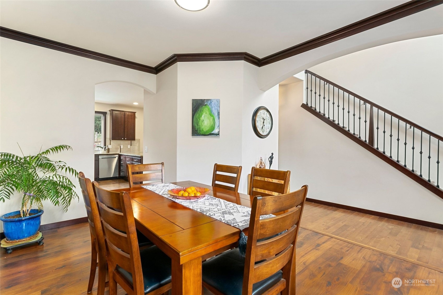 408 171st Street Southeast Bothell, WA 98012 - Photo 5 of 31 a dining room with furniture and wooden floor