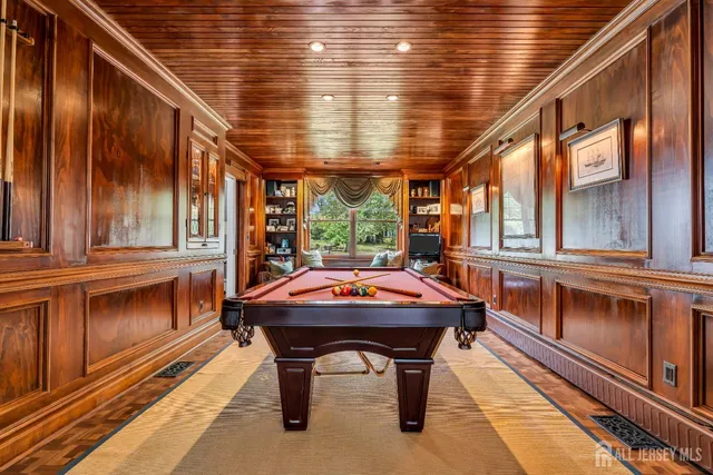 a kitchen with stainless steel appliances granite countertop a sink and a stove