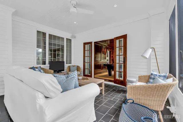 a kitchen with stainless steel appliances granite countertop a sink a stove and refrigerator