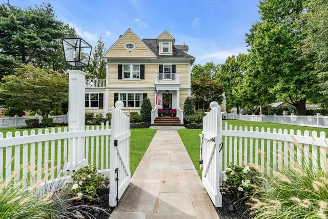 a view of entryway with wooden floor and stairs