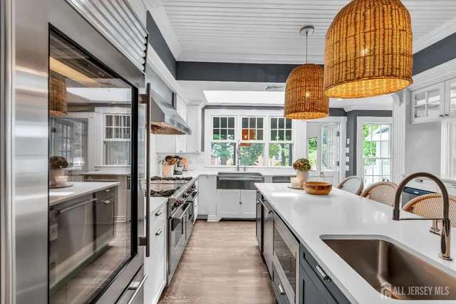 a bathroom with a sink toilet a mirror and shower