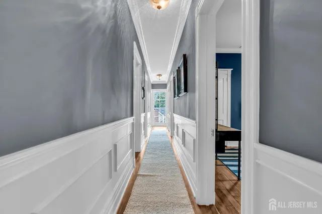 a front view of a house with a yard table and chairs