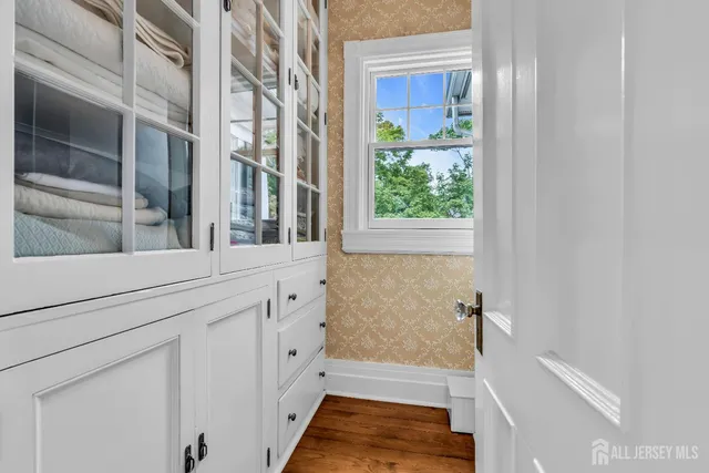 a view of staircase with white walls