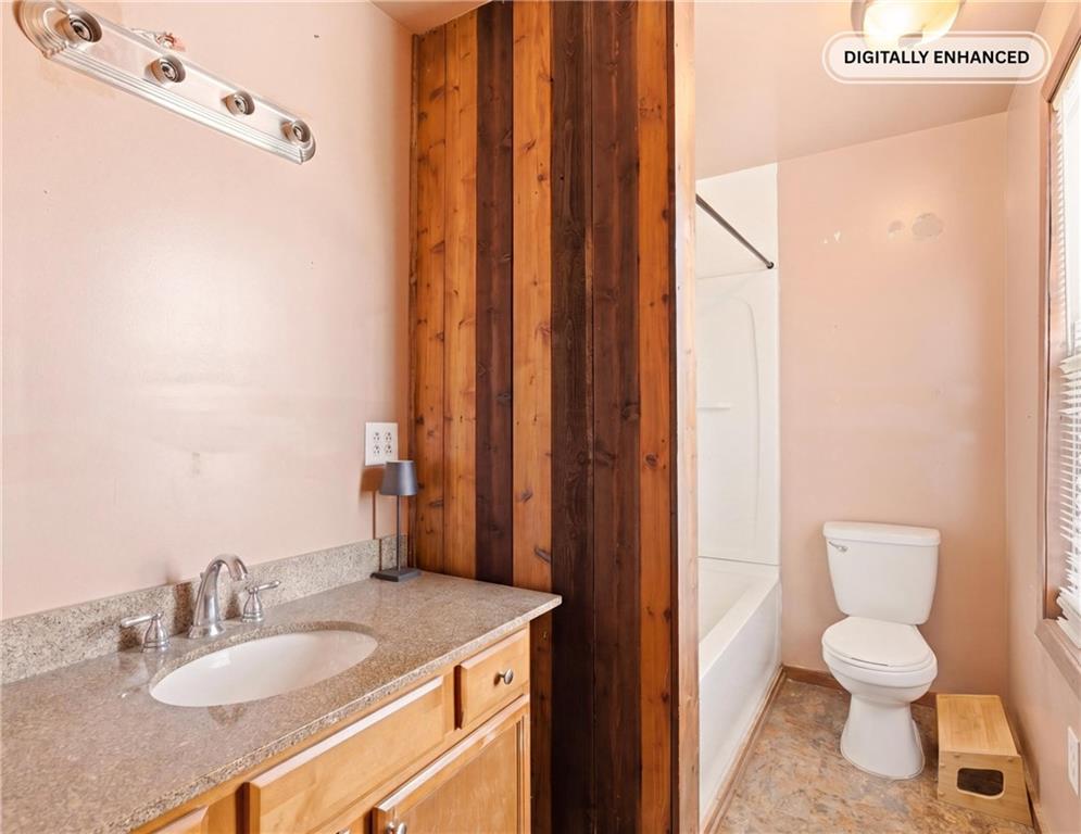 3 Chestnut Street Meyersdale, PA 15552 - Photo 13 of 28 a bathroom with a granite countertop sink toilet and shower