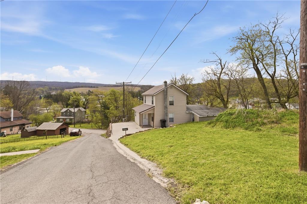 3 Chestnut Street Meyersdale, PA 15552 - Photo 2 of 28 a swimming pool with outdoor seating and yard