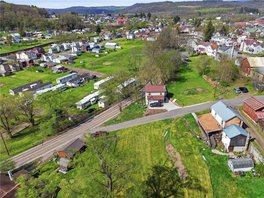 3 Chestnut Street Meyersdale, PA 15552 - Photo 25 of 28 an aerial view of a residential houses with city street and mountain view