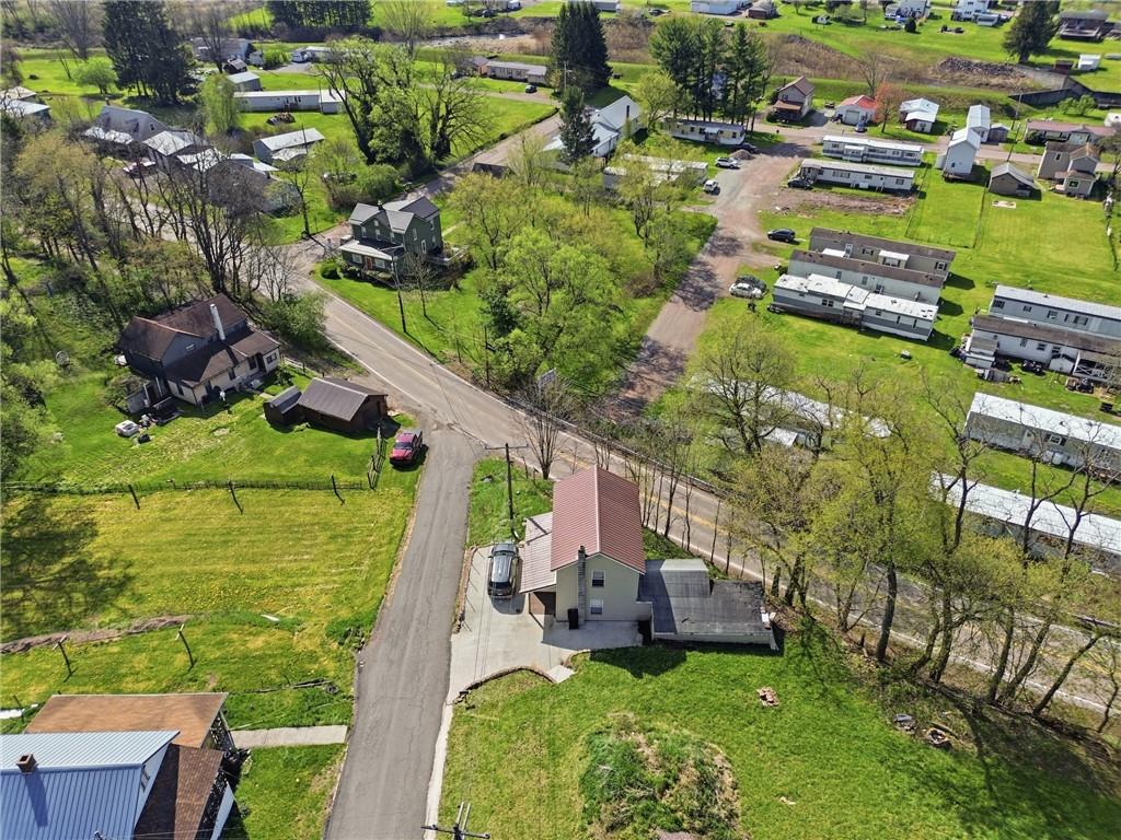 3 Chestnut Street Meyersdale, PA 15552 - Photo 26 of 28 an aerial view of a house with a garden and lake view