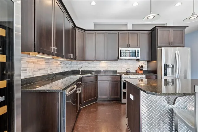 a very nice looking kitchen with a large window