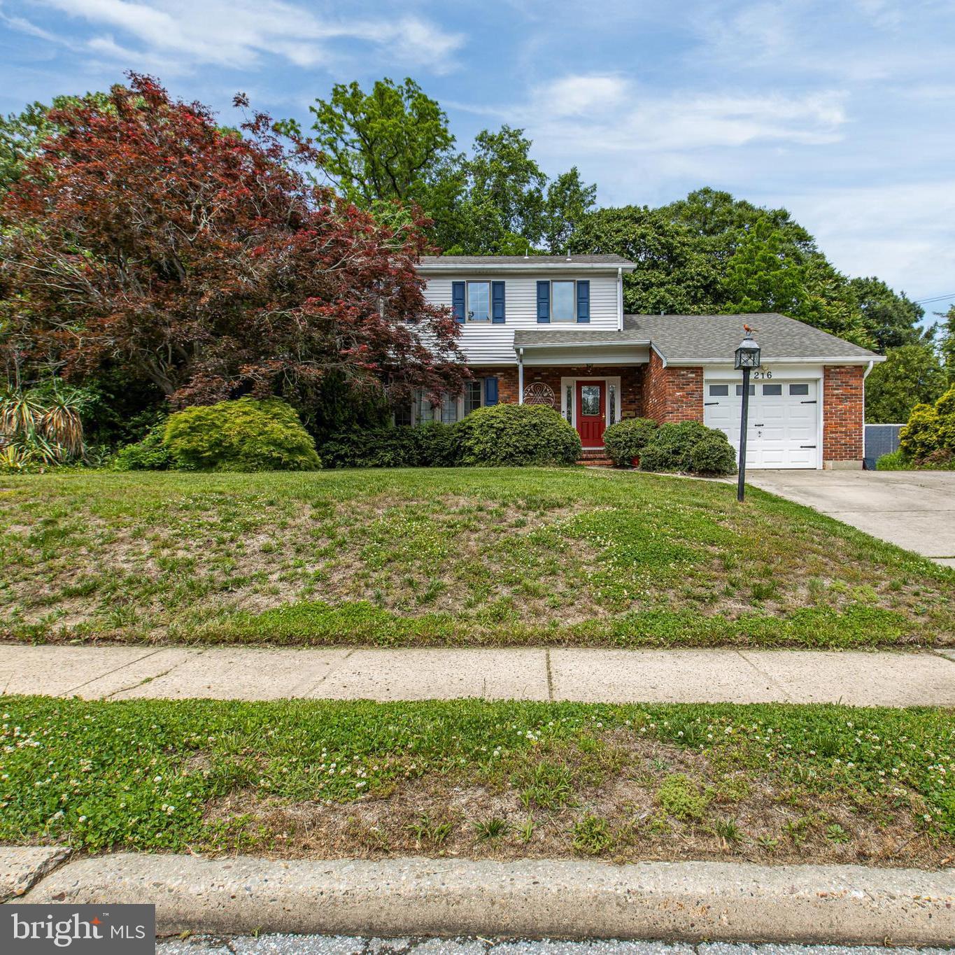 216 Revere Road Marlton, NJ 08053 - Photo 1 of 47 a view of a house with a yard