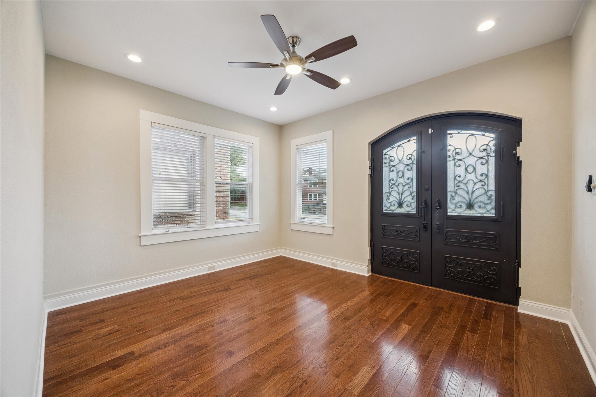 1220 West Gray Street Houston, TX 77019 - Photo 17 of 49 wooden floor and windows in a room