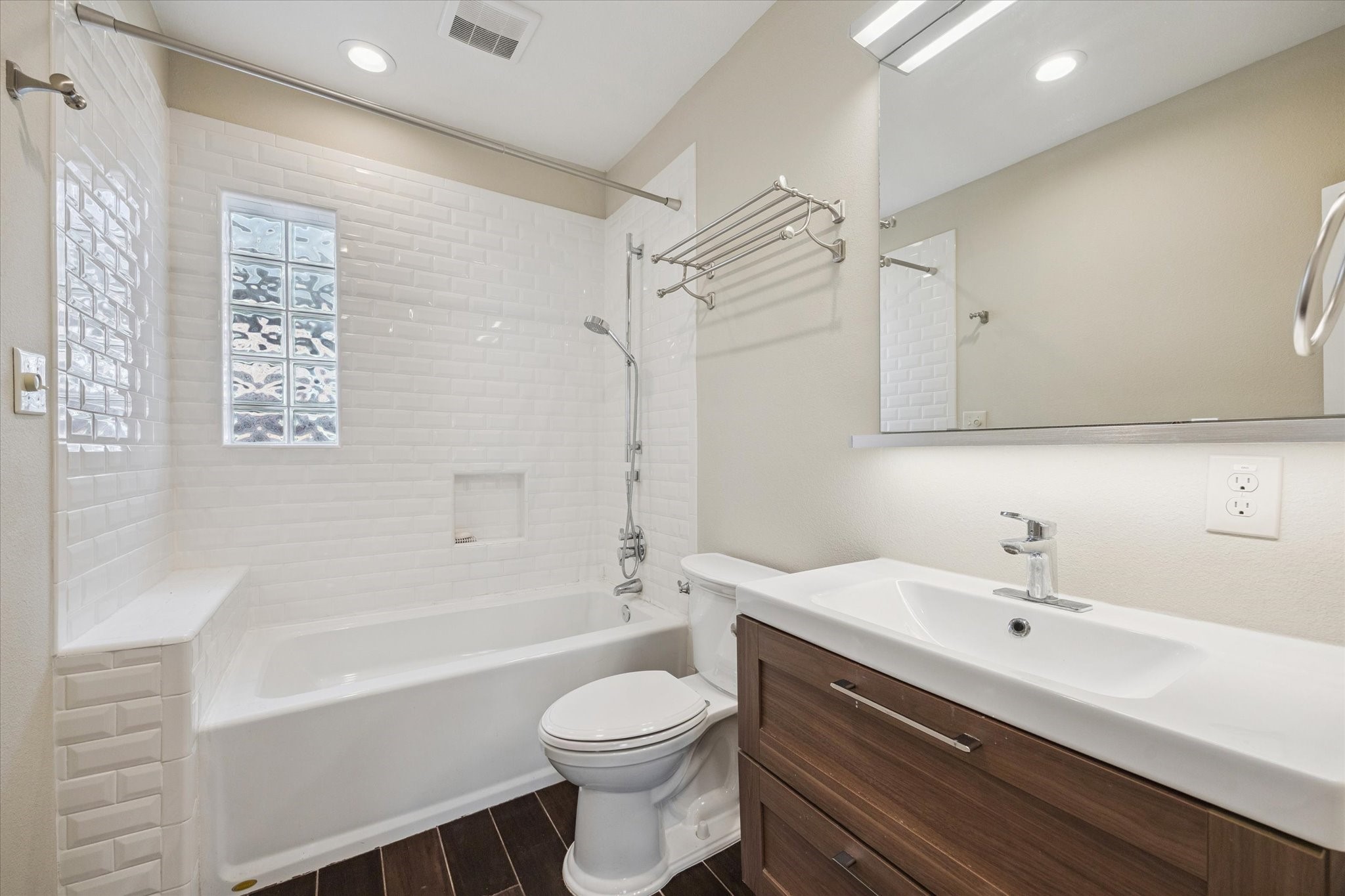 1220 West Gray Street Houston, TX 77019 - Photo 34 of 49 a bathroom with a sink a toilet and shower