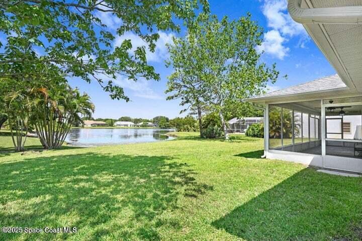 3360 Holly Springs Road Melbourne, FL 32934 - Photo 24 of 30 a view of a house with a yard