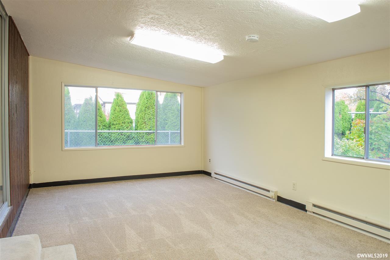 4831 Bailey Road Northeast Keizer, OR 97303 - Photo 11 of 19 an empty room with windows