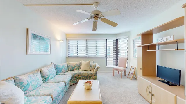 a bathroom with a sink toilet and mirror