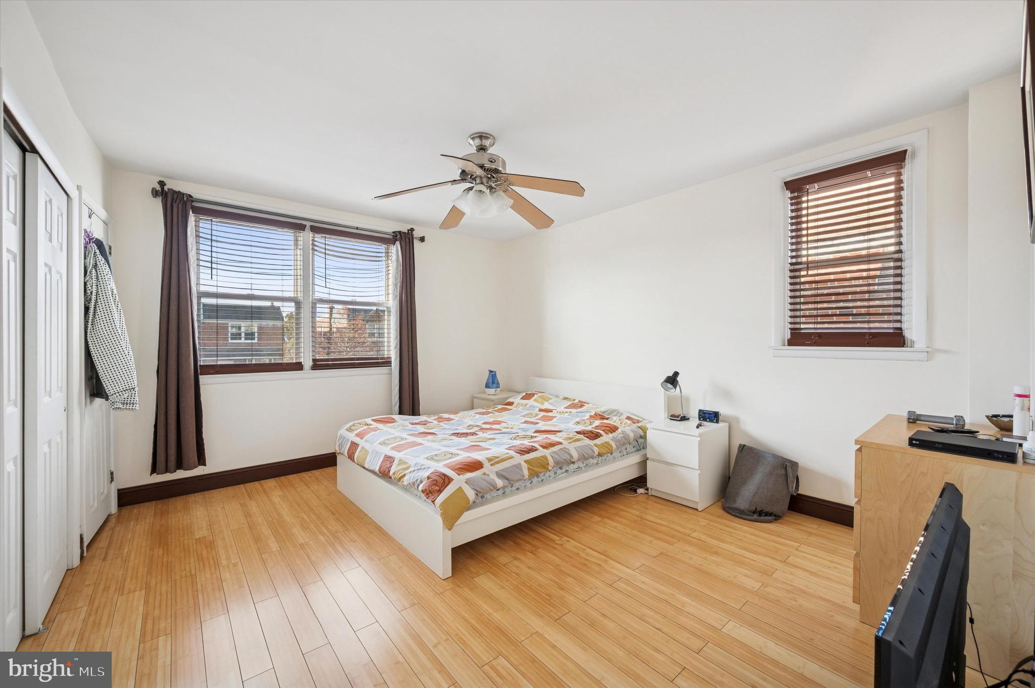1813 Bergen Street Philadelphia, PA 19152 - Photo 10 of 15 a bedroom with a bed and wooden floor