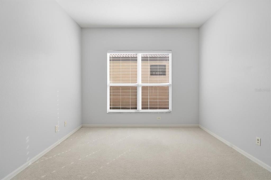 1196 West Diamond Shore Loop Hernando, FL 34442 - Photo 19 of 40 an empty room with a window