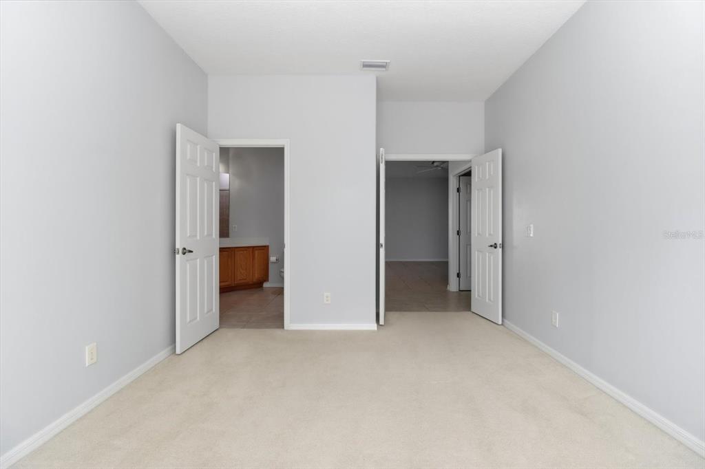1196 West Diamond Shore Loop Hernando, FL 34442 - Photo 20 of 40 a view of an empty room with closet and a bathroom