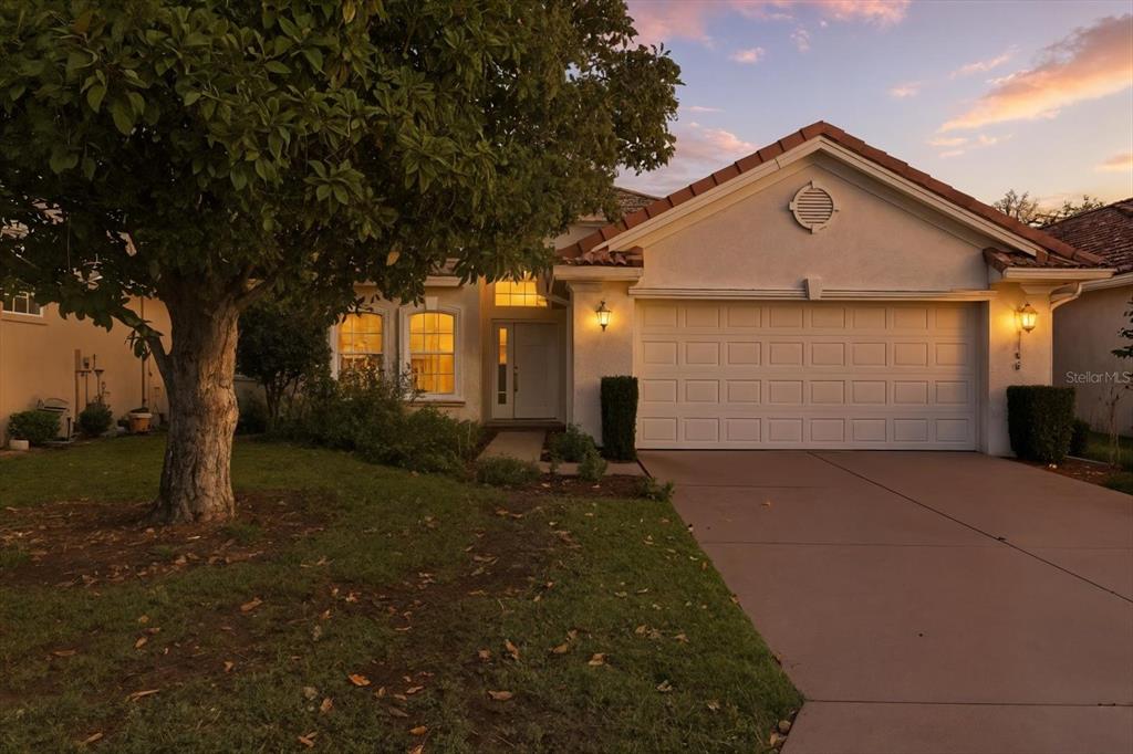 1196 West Diamond Shore Loop Hernando, FL 34442 - Photo 2 of 40 a front view of house with yard