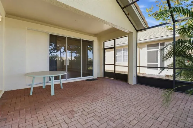 a view of a chairs and table in a room