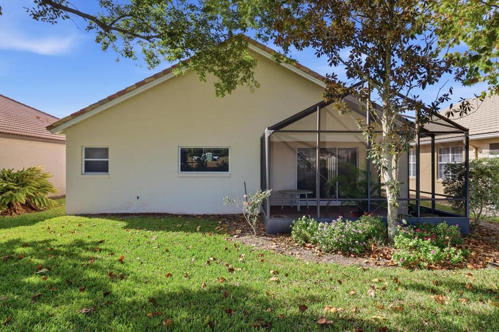 1196 West Diamond Shore Loop Hernando, FL 34442 - Photo 34 of 40 a view of a house with backyard and garden