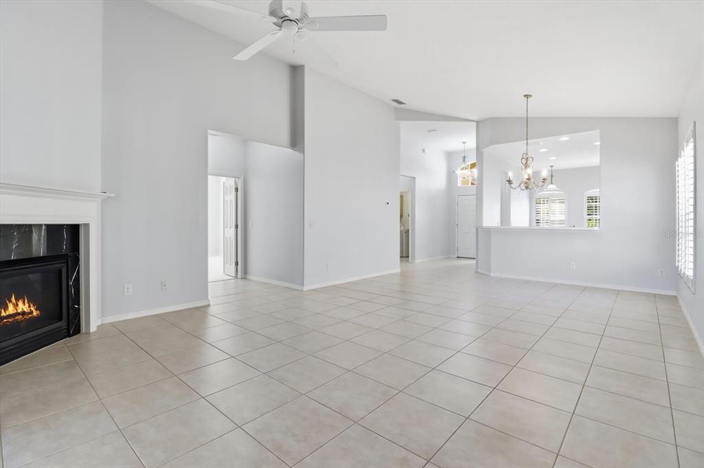1196 West Diamond Shore Loop Hernando, FL 34442 - Photo 8 of 40 a view of an empty room with window and fireplace