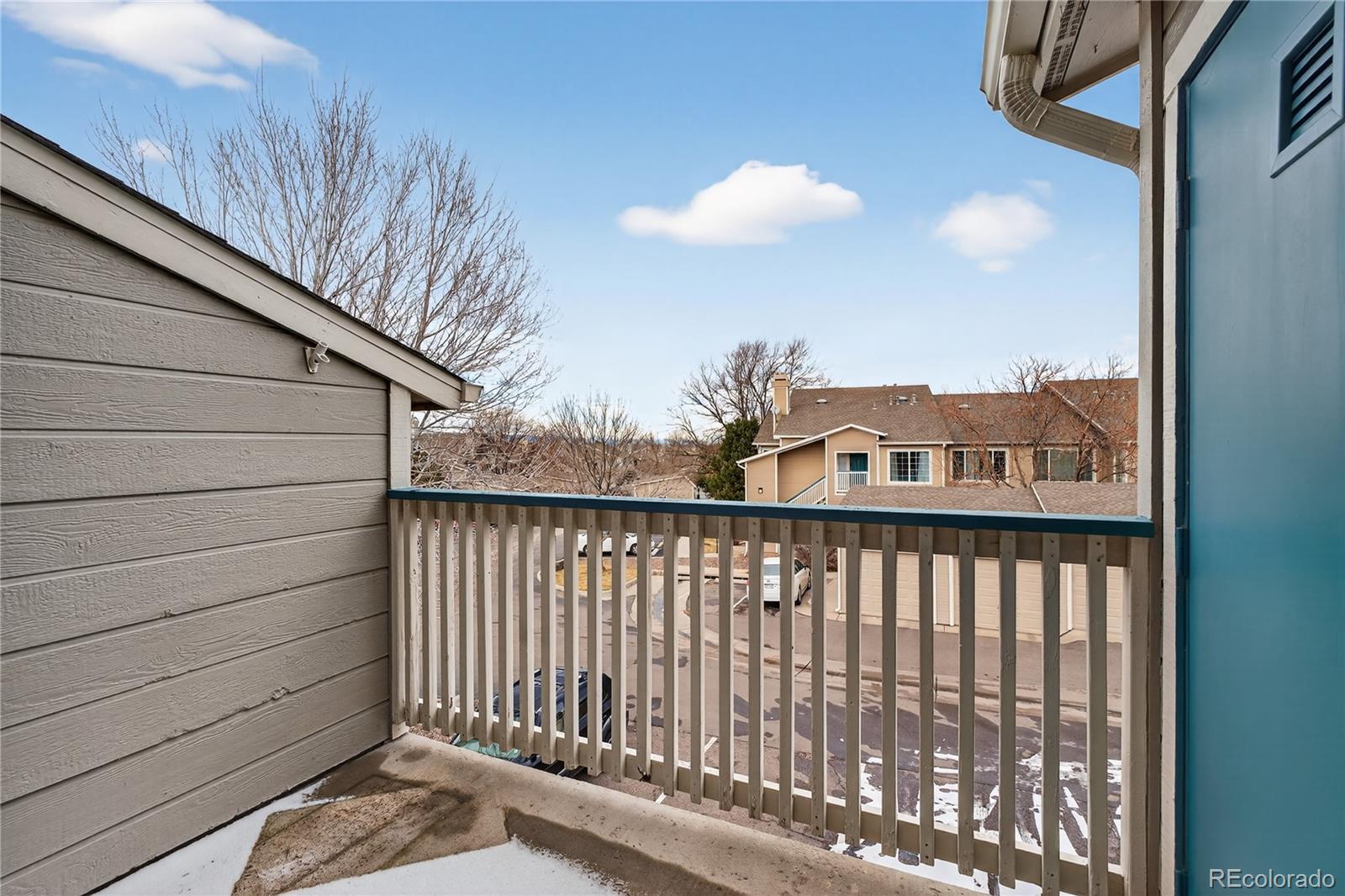 8406 Pebble Creek Way, Unit 204 Highlands Ranch, CO 80126 - Photo 23 of 29 a view of a balcony with a pot