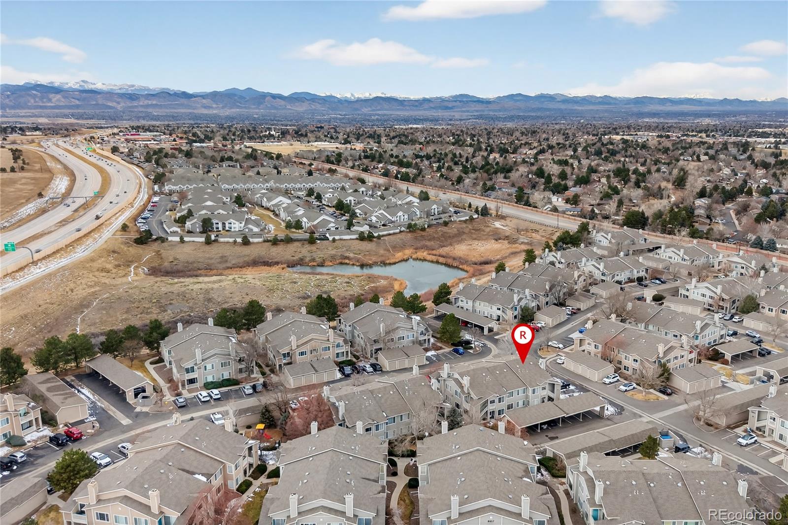 8406 Pebble Creek Way, Unit 204 Highlands Ranch, CO 80126 - Photo 27 of 29 an aerial view of a city