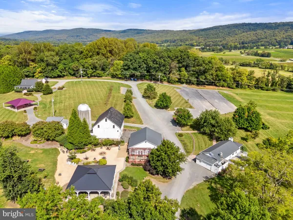 a aerial view of a house with a ocean view