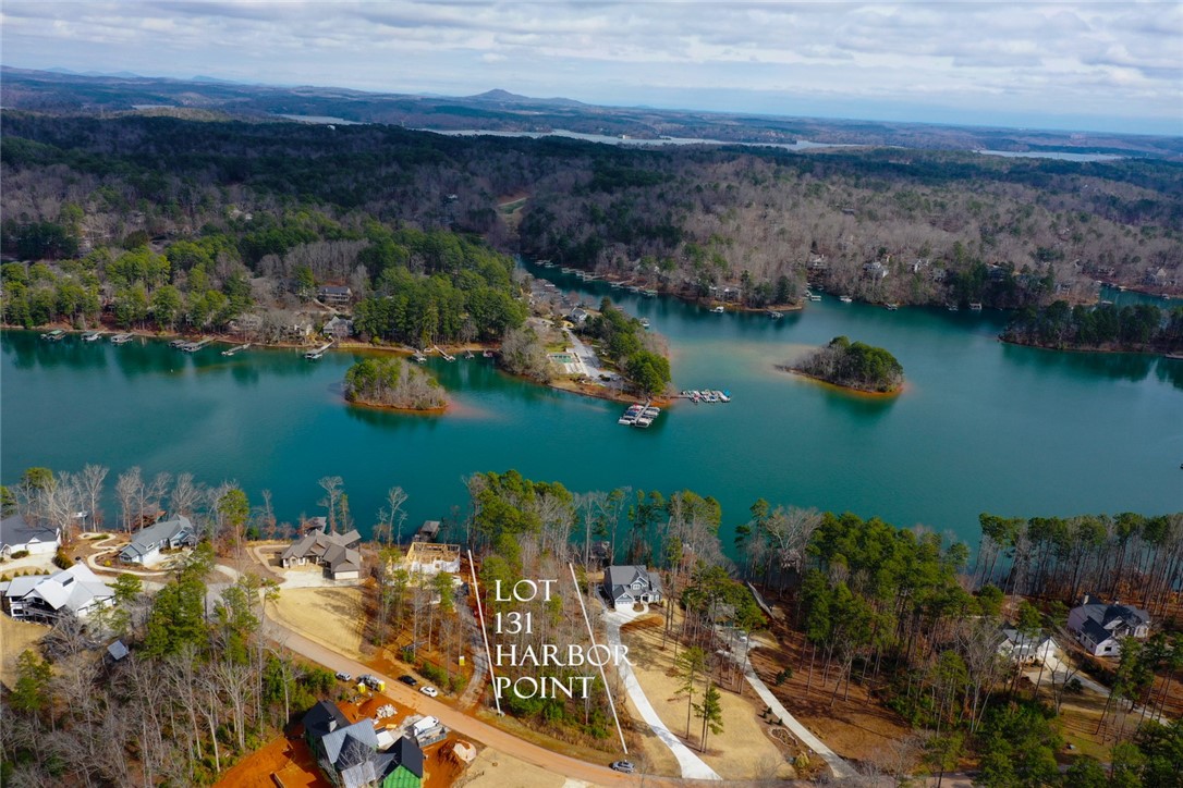 Lot 131 Harbor Point Seneca, SC 29672 - Photo 1 of 48 This aerial view showcases a picturesque waterfront property, offering serene lake views and lush surroundings.