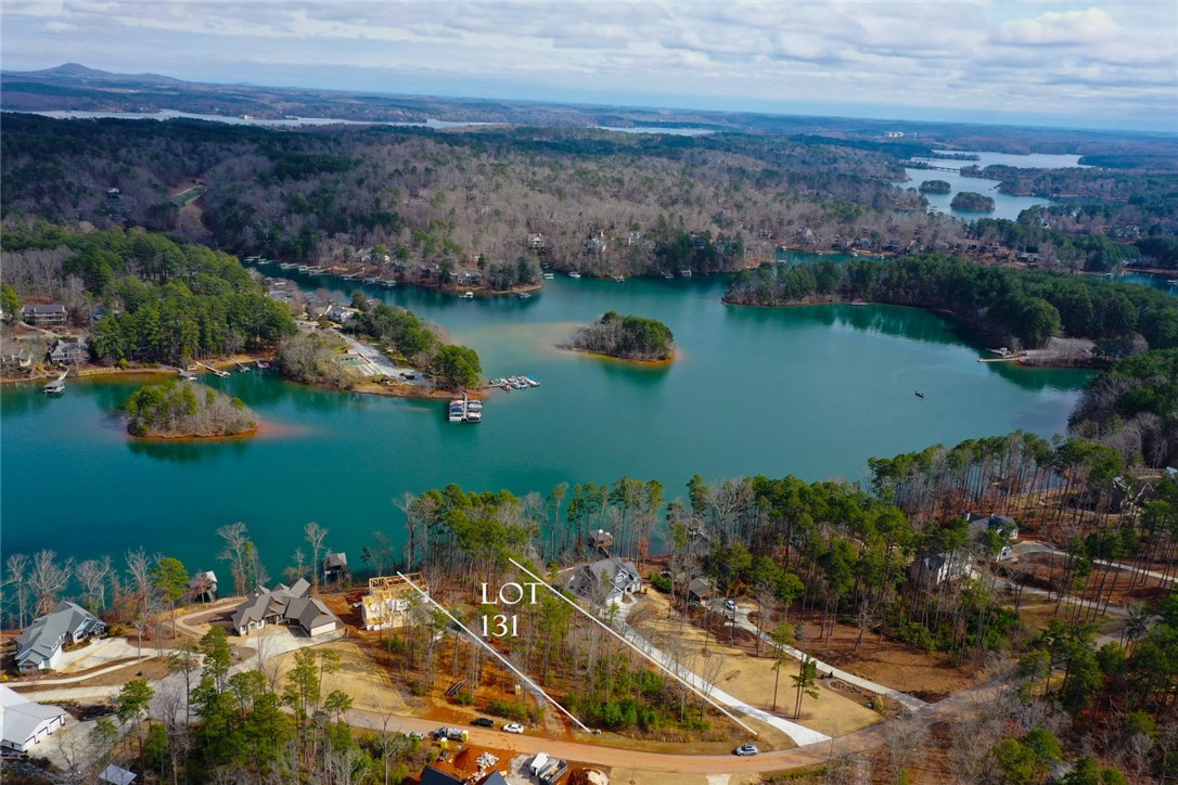 Lot 131 Harbor Point Seneca, SC 29672 - Photo 15 of 48 This elevated view captures a serene lakeside community with verdant surroundings.