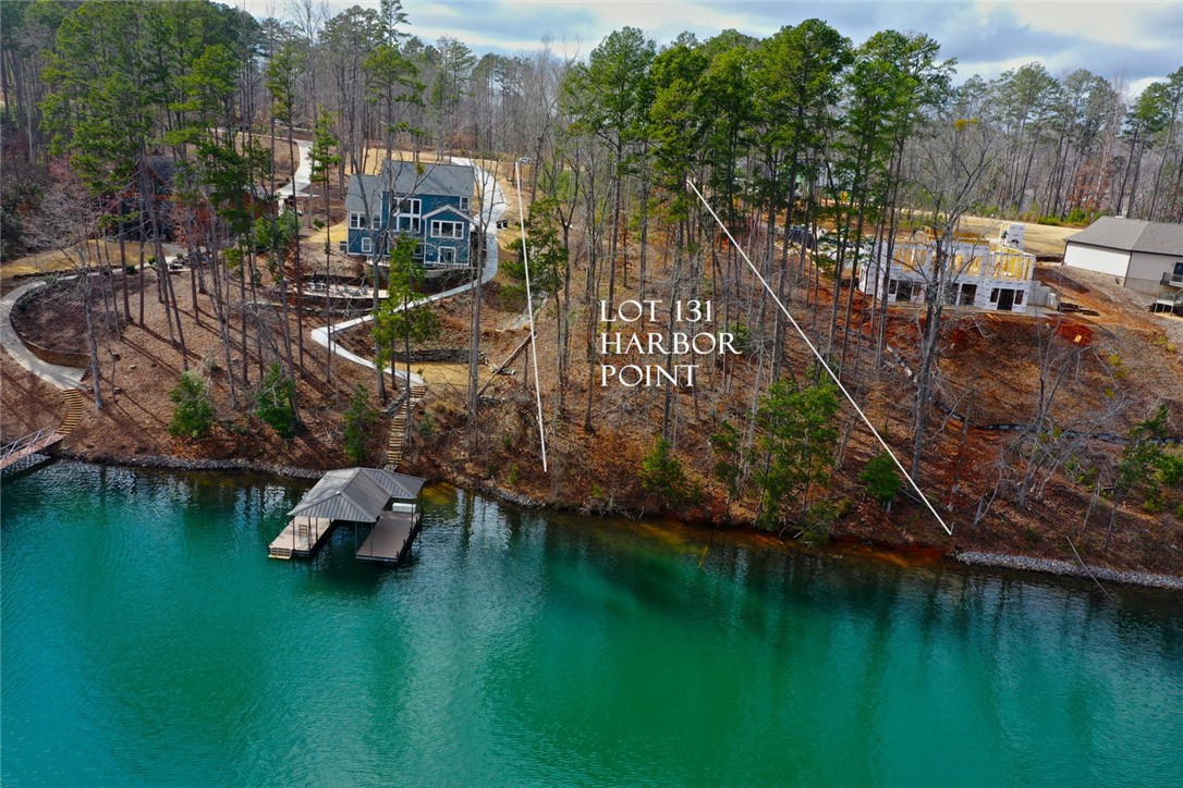 Lot 131 Harbor Point Seneca, SC 29672 - Photo 18 of 48 This serene waterfront lot offers direct lake access and a private boat dock.