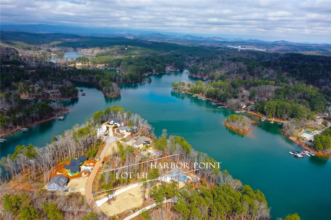 Lot 131 Harbor Point Seneca, SC 29672 - Photo 3 of 48 This tranquil waterfront community offers scenic lake views and mountain vistas for an idyllic retreat.