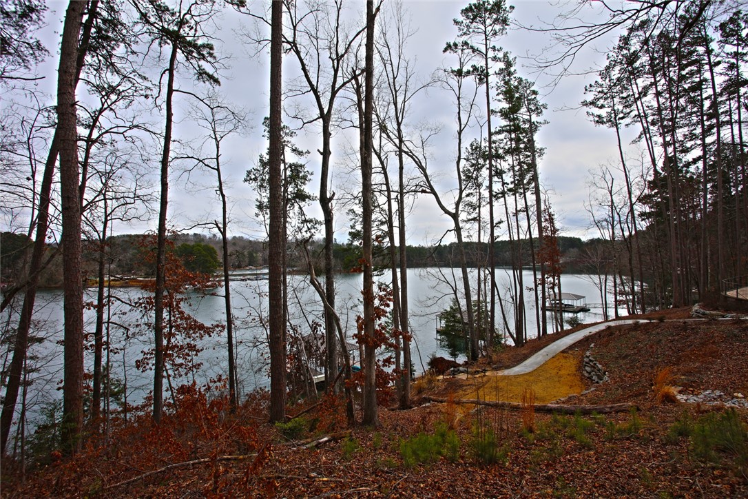 Lot 131 Harbor Point Seneca, SC 29672 - Photo 33 of 48 This serene waterfront lot provides a tranquil escape with direct access to the lake.