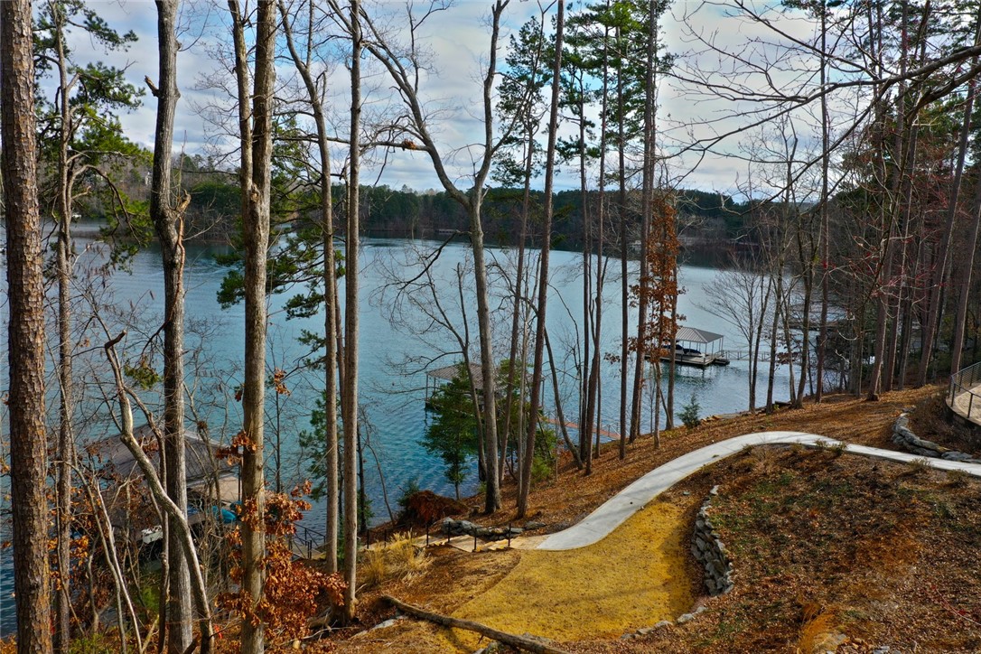 Lot 131 Harbor Point Seneca, SC 29672 - Photo 6 of 48 This serene lakeside property offers picturesque water views and convenient boat access.