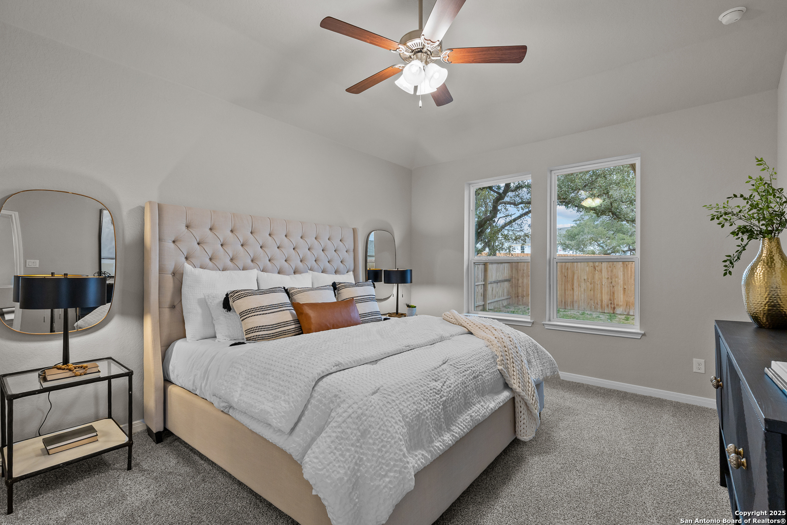 15593 Bonnethead Road San Antonio, TX 78253 - Photo 5 of 11 a bedroom with double bed and a window