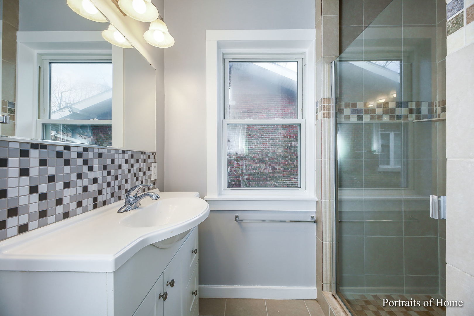 952 Black Road Joliet, IL 60435 - Photo 13 of 25 a bathroom with a sink a toilet and shower