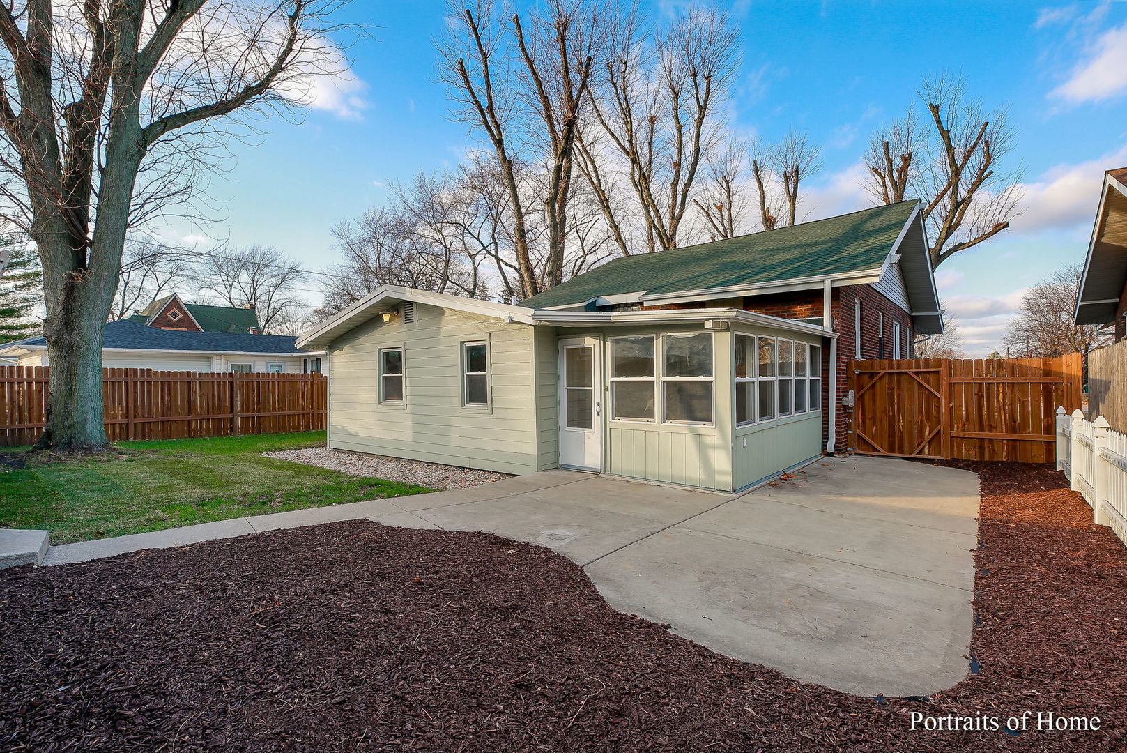 952 Black Road Joliet, IL 60435 - Photo 21 of 25 a view of a house with a back yard