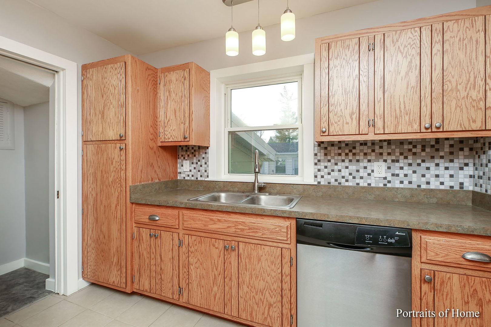 952 Black Road Joliet, IL 60435 - Photo 6 of 25 a kitchen with a sink and a window