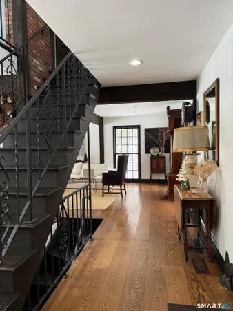 a view of livingroom with furniture and staircase