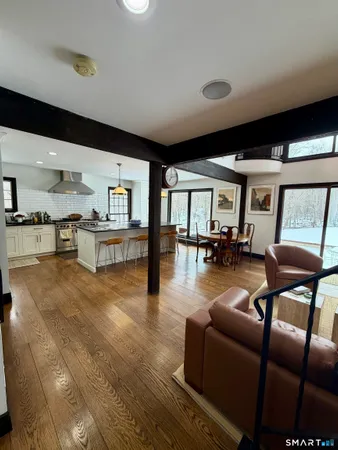 a living room with furniture and a table